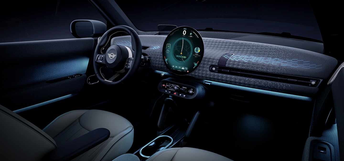 Interior view of the all-electric MINI Cooper with ambient light in blue.